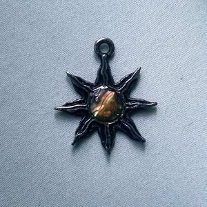 Rare vintage sun / star pendant